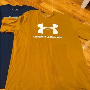 Men’s size medium Under Armour shirts. Two shirts total.